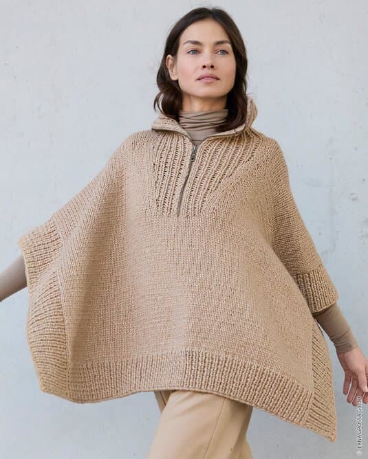 PONCHO WITH RIBBED PATTERN - Winter Softness
Show details